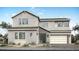 Charming two-story home with a two-car garage, desert landscaping and covered front entryway at 2494 E Tepenade Dr, San Tan Valley, AZ 85140