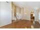 Bright living room with hardwood floors, neutral paint, and an open layout, ideal for entertaining guests at 2550 E Taro Ln, Phoenix, AZ 85050