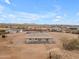 Aerial view showcases home with surrounding landscape and neighborhood at 28834 N 175Th Ave, Surprise, AZ 85387