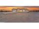 This is a contemporary-style single-Gathering home featuring stucco siding, attached garage, and desert landscaping at 28834 N 175Th Ave, Surprise, AZ 85387