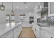 Open kitchen features a central island with views of the gourmet style oven and appliances at 28834 N 175Th Ave, Surprise, AZ 85387