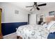 Comfortable bedroom with carpet, bi-fold closet doors and half wall accent at 3423 E Crescent Way, Gilbert, AZ 85298