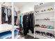 Organized walk-in closet with ample storage for clothing, shoes, and accessories at 3423 E Crescent Way, Gilbert, AZ 85298