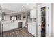 Beautiful kitchen area with stainless steel appliances and a pass-through to the living area at 3423 E Crescent Way, Gilbert, AZ 85298