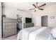 Spacious main bedroom featuring neutral tones, en suite bathroom and comfortable layout at 3423 E Crescent Way, Gilbert, AZ 85298