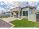 A beautifully landscaped backyard with an outdoor dining area and grill, perfect for entertaining at 3439 E Shannon St, Gilbert, AZ 85295
