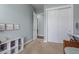 Light and airy bedroom with carpet and view into the hallway and closet at 3439 E Shannon St, Gilbert, AZ 85295