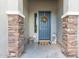 Inviting front entry featuring stone pillars and decorative details at 3439 E Shannon St, Gilbert, AZ 85295