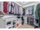 Organized walk-in closet with hanging rods, shelving, and storage solutions for clothes and accessories at 3439 E Shannon St, Gilbert, AZ 85295