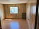 Bedroom with wood paneled walls, simple and functional at 345 S 58Th St # 31, Mesa, AZ 85206