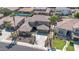 Beautiful home showcasing tile roof, desert landscaping, a fountain, and a spacious driveway at 3925 E Vallejo Dr, Gilbert, AZ 85298