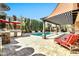 Backyard featuring pool, outdoor kitchen, patio, and gazebo at 3925 E Vallejo Dr, Gilbert, AZ 85298