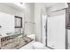 Modern bathroom with a glass shower, vessel sink, and sleek fixtures at 3925 E Vallejo Dr, Gilbert, AZ 85298