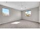 Bedroom with large windows allowing natural light and gray walls at 3925 E Vallejo Dr, Gilbert, AZ 85298