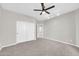 Spacious bedroom featuring neutral carpet and closet at 3925 E Vallejo Dr, Gilbert, AZ 85298