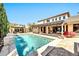 Stunning pool area featuring water features and manicured landscaping, perfect for relaxation at 3925 E Vallejo Dr, Gilbert, AZ 85298