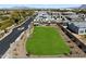 Community park with playground, picnic area, and spacious green lawn offering a Gathering-friendly environment at 4023 E Minton Cir, Mesa, AZ 85215