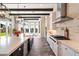 Modern kitchen features stainless steel appliances, large island and a view of the backyard at 4023 E Minton Cir, Mesa, AZ 85215