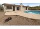 Backyard features a private in-ground pool and a low-maintenance landscape at 4111 W Desert Cove Ave, Phoenix, AZ 85029