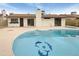 Backyard pool and spa features a dolphin mosaic and well maintained outdoor space at 4111 W Desert Cove Ave, Phoenix, AZ 85029