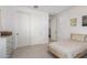 Cozy bedroom featuring carpet, a window, and a wardrobe at 4237 E Sierra Madre Ave, Gilbert, AZ 85296