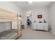 Bright bedroom with bunk beds and a white dresser at 4237 E Sierra Madre Ave, Gilbert, AZ 85296