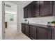 Hallway with built-in cabinets and access to the bedroom at 4237 E Sierra Madre Ave, Gilbert, AZ 85296
