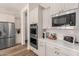 Modern kitchen with stainless steel appliances, stylish cabinets, and plenty of counter space at 4237 E Sierra Madre Ave, Gilbert, AZ 85296