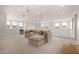 Expansive loft with cozy sectional sofa, offering ample space for relaxation and entertainment at 4237 E Sierra Madre Ave, Gilbert, AZ 85296