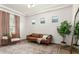 Bright living room featuring a cozy brown sofa, modern decor, and large mirror in a spacious setting at 4237 E Sierra Madre Ave, Gilbert, AZ 85296