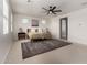 Inviting main bedroom with area rug and a ceiling fan at 4237 E Sierra Madre Ave, Gilbert, AZ 85296