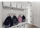 Mudroom with hooks, storage cubbies and white shelves at 4237 E Sierra Madre Ave, Gilbert, AZ 85296