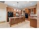 Spacious kitchen boasts stainless steel appliances, a center island, and ample cabinet space at 4413 S Tigre Del Mar Dr, Gold Canyon, AZ 85118