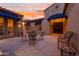 Charming outdoor patio with comfortable seating under the evening sky at 4413 S Tigre Del Mar Dr, Gold Canyon, AZ 85118