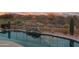 Refreshing pool featuring serene views of the desert landscape and distant mountains at 4413 S Tigre Del Mar Dr, Gold Canyon, AZ 85118