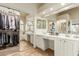 Bright bathroom with double sinks, vanity space, separate tub, and walk-in shower at 4630 E Mountain Vista Dr, Phoenix, AZ 85048