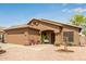 Inviting home showcasing mature landscaping and a cozy front porch with comfortable seating at 4630 E Mountain Vista Dr, Phoenix, AZ 85048