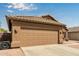 Spacious two-car garage and xeriscaped front yard at 4630 E Mountain Vista Dr, Phoenix, AZ 85048