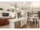 Open floor plan with a combined living, dining, and kitchen space at 4630 E Mountain Vista Dr, Phoenix, AZ 85048