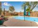 Relaxing pool area with lush landscaping, patio gazebo, and surrounding block fence for added privacy at 4630 E Mountain Vista Dr, Phoenix, AZ 85048