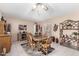 Cozy dining area featuring a wooden table with seating for six at 4838 E Calypso Ave, Mesa, AZ 85206