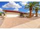 Charming brick home featuring desert landscaping, a paved driveway, and a prominent palm tree in the front yard at 4838 E Calypso Ave, Mesa, AZ 85206