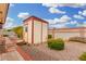 Storage shed and additional landscaping in the backyard with plenty of sunshine at 4838 E Calypso Ave, Mesa, AZ 85206