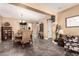 A dining room that features neutral walls, tile flooring and a charming decor at 520 S 196Th Dr, Buckeye, AZ 85326