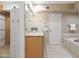 Bright bathroom featuring a walk-in closet, shower, vanity, and soaking tub at 6340 N 34Th Pl, Paradise Valley, AZ 85253