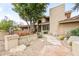 Elegant brick home with a well-manicured landscape and a stone walkway leading to the entrance at 6340 N 34Th Pl, Paradise Valley, AZ 85253