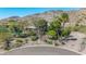 Desert home featuring mountain views, desert landscaping, and a sparkling swimming pool at 6340 N 34Th Pl, Paradise Valley, AZ 85253