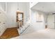 Bright foyer featuring high ceilings, a staircase, and neutral walls, perfect for showcasing art at 6340 N 34Th Pl, Paradise Valley, AZ 85253