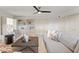 Bright living room featuring neutral colors, ceiling fan, and built in cabinets at 6340 N 34Th Pl, Paradise Valley, AZ 85253
