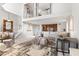 Spacious living room with plush seating, custom shelving, and a light, airy feel at 6340 N 34Th Pl, Paradise Valley, AZ 85253